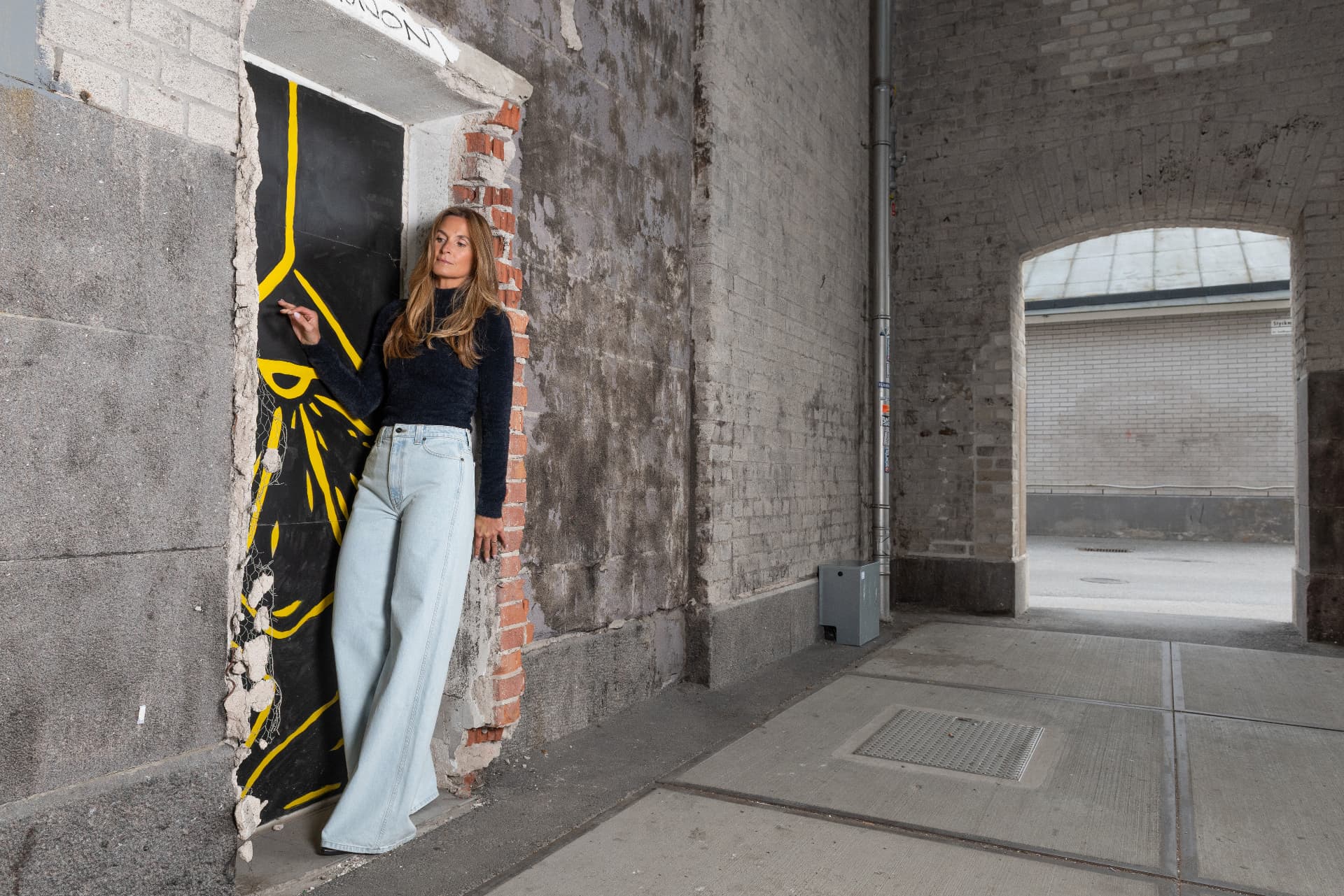 Filippa Tjärnlund in an industrial passage